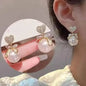 925 silver Korean fashion pearl tassel earrings for women featuring zircon accents and elegant pearl dangles.