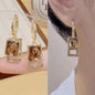 925 silver Korean fashion pearl tassel earrings with zircon accents, featuring elegant pearl drops for women's jewelry style.
