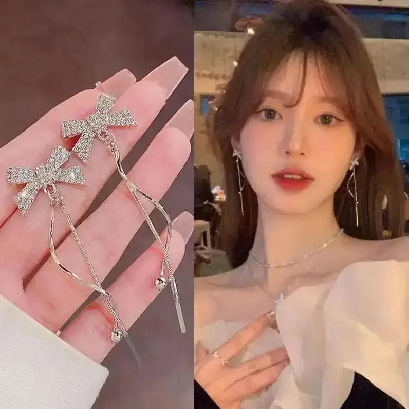 925 silver Korean fashion pearl tassel earrings for women featuring zircon accents and elegant pearl detailing.