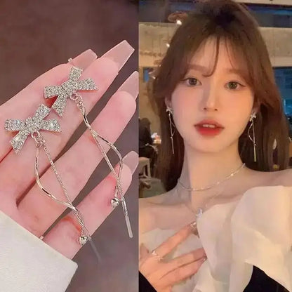 925 silver Korean fashion pearl tassel earrings for women featuring zircon accents and elegant pearl detailing.