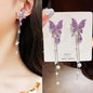 925 silver Korean fashion pearl tassel earrings with zircon accents, featuring elegant pearl dangles for women's jewelry.