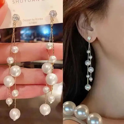 925 silver Korean fashion pearl tassel earrings for women featuring zircon accents and elegant pearl detailing.