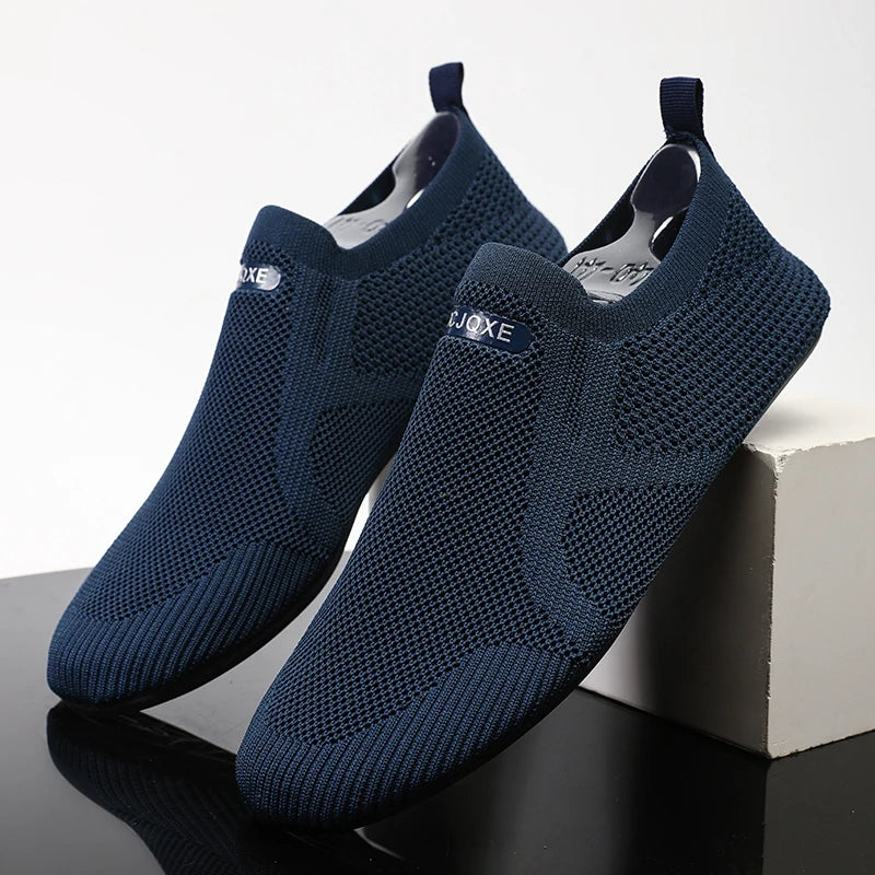 Men's blue four seasons casual shoes by BackupMyFilesNow.com, featuring comfortable indoor outdoor design and stylish footwear.