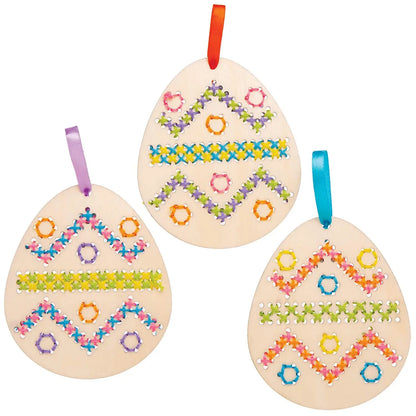 Wooden DIY embroidery kit with Easter egg designs for children, includes sewing supplies for Easter craft and decoration.