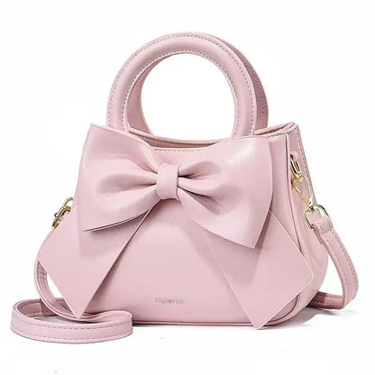 Fashion casual women's handbags with cute bows in black, white, blue, and khaki, featuring PU material and trendy shoulder designs.