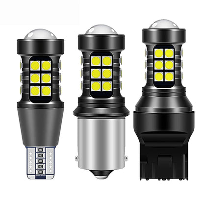 Two white LED car signal bulbs, 1156 BA15S T15 W16W 7440 W21W T20 3030 LED bulbs for brake, reverse, and signal lights.