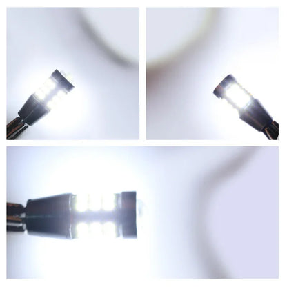 Two white LED bulbs for car signals, brake, reverse lights, compatible with 1156 BA15S P21W T15 W16W 7440 W21W T20 sockets.
