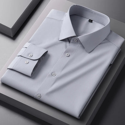 White bamboo fiber men's dress shirt with long sleeves, slim fit, anti-wrinkle fabric, suitable for business and social occasions.