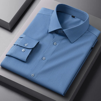 White long sleeve bamboo fiber men's dress shirt by BACKUPMYFILESNOW.COM®, slim fit, anti-wrinkle, suitable for business and formal wear.