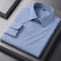 White bamboo fiber anti-wrinkle men's long sleeve dress shirt in slim fit, available in sizes S to 8XL, for business and formal wear.
