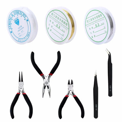 Jewelry making supplies kit with tools, earring charms, jewelry wires, and findings for DIY jewelry making and repair.