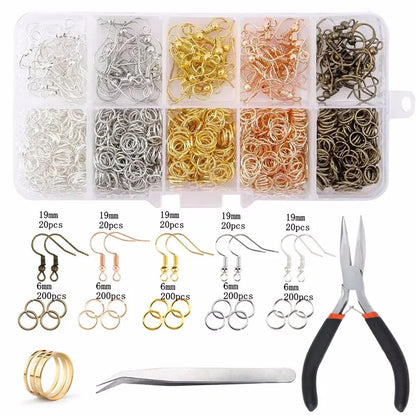 Jewelry making supplies kit including tools, earring charms, jewelry wires, and findings for jewelry making and repair.