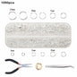 Jewelry making supplies kit with tools, earring charms, jewelry wires, and findings for creating and repairing jewelry.