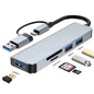 8-in-1 USB 3.0 Type-C hub with SD and TF card reader, dual-head design, and 3.5mm audio jack for laptops.