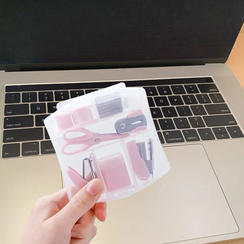 Pink 8-piece mini office supply kit including stapler, scissors, staple remover, tape dispenser, staples, and scrapbook tools.