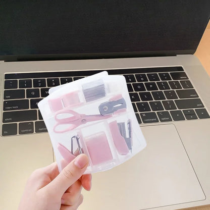 Pink 8-piece mini office supply kit including stapler, scissors, staple remover, tape dispenser, staples, and scrapbook tools.