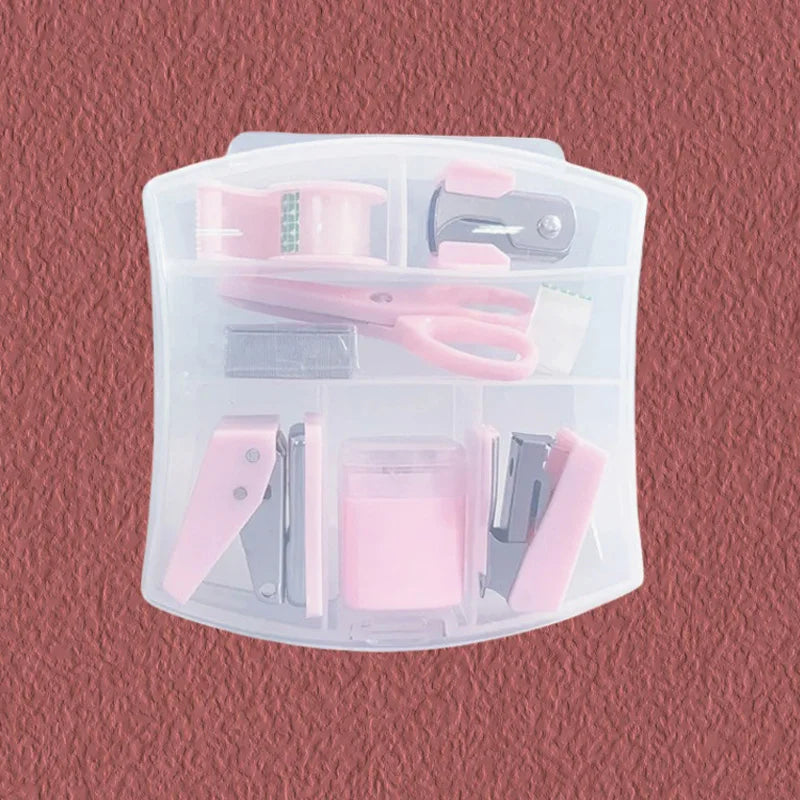 Pink 8-piece mini office supply kit including stapler, scissors, staple remover, tape dispenser, and scrapbook tools.