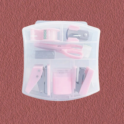 Pink 8-piece mini office supply kit including stapler, scissors, staple remover, tape dispenser, and scrapbook tools.