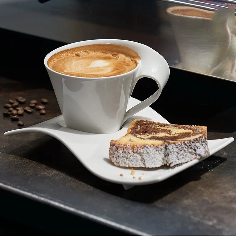 White ceramic wavy espresso cup with modern design, ideal for coffee, breakfast, or dessert, perfect for couples or home decor.