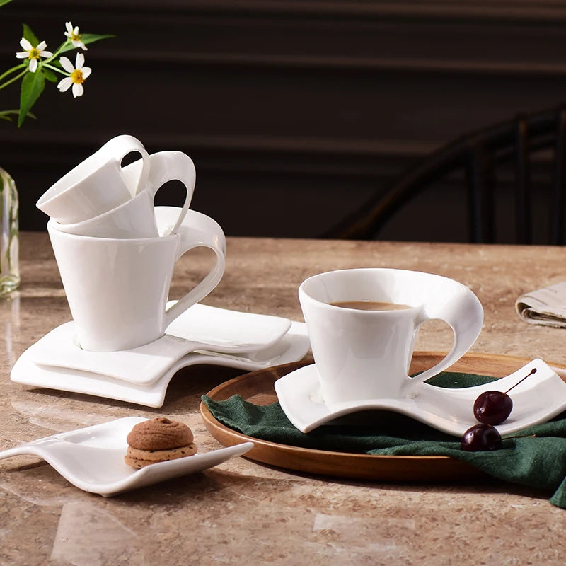 White ceramic wavy espresso cup from BackupMyFilesNow.com, ideal for coffee, breakfast, or dessert, with modern home decor style.