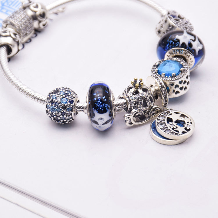 Blue glass crystal bracelet with silver 925 setting, women's jewelry featuring elegant sparkling gemstones.