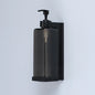 Wall-mounted hotel shampoo and shower gel bottles with hand sanitizer boxes and manual soap dispensers for bathroom use.