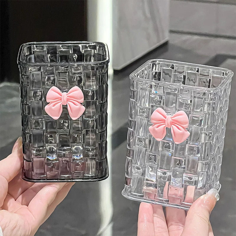 Desktop pen holder and storage box by BackupMyFilesNow.com with a decorative bow, ideal for organizing office supplies.