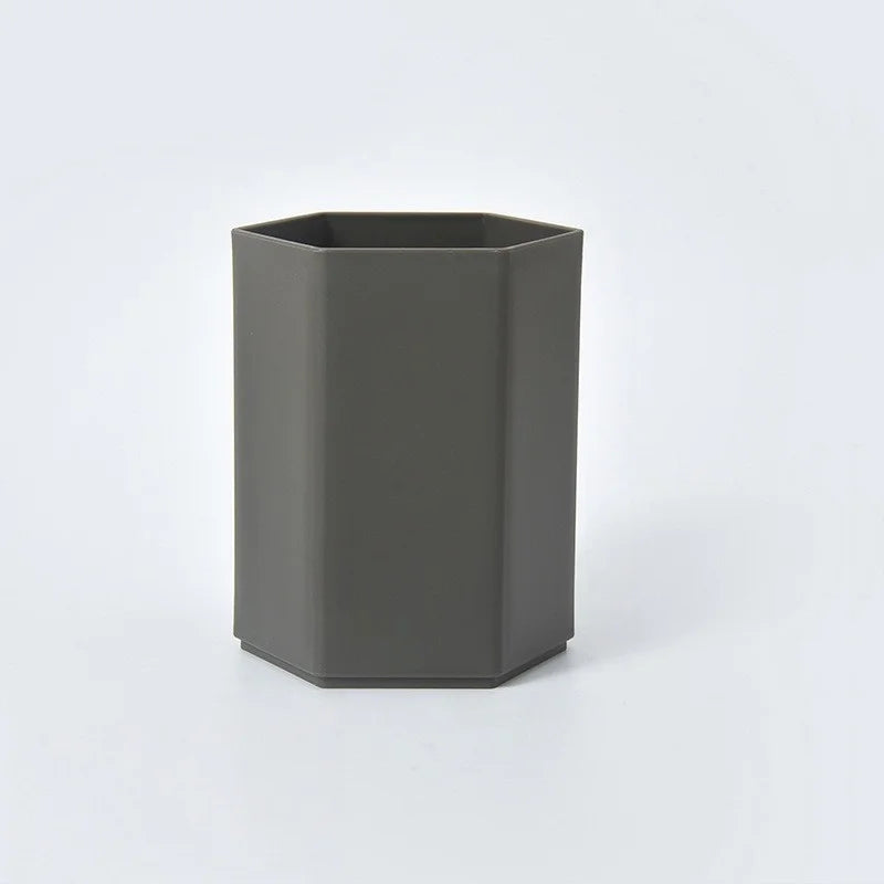 Durable BackupMyFilesNow.com desktop pen holder with multiple compartments for office supplies and study tools.