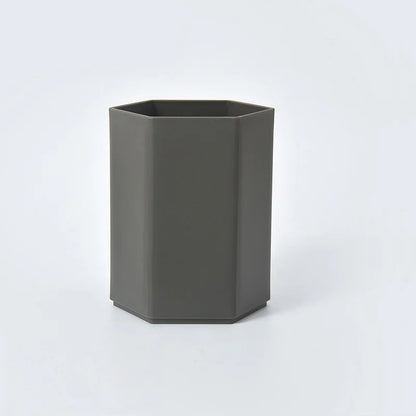 Durable BackupMyFilesNow.com desktop pen holder with multiple compartments for office supplies and study tools.