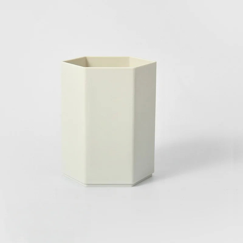 Durable desktop pen holder by BackupMyFilesNow.com with multiple compartments for pens, pencils, and office supplies.