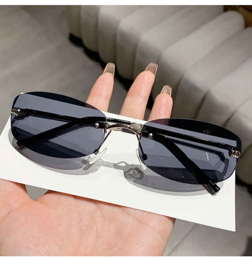 Luxury frameless sunglasses by 2025Fashion, stylish for women and men, UV400 protection, suitable for travel, hiking, and driving.