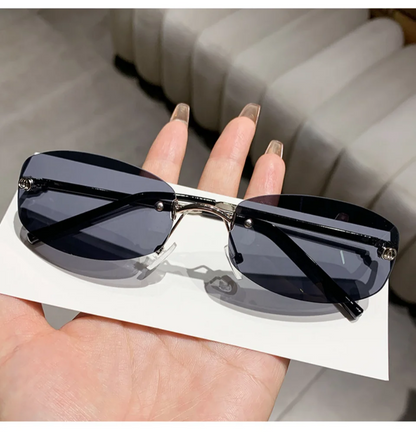 Luxury frameless sunglasses by 2025Fashion, stylish for women and men, UV400 protection, suitable for travel, hiking, and driving.