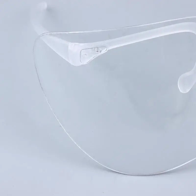 Unisex safety goggles with dust-proof and anti-splash lenses, suitable for outdoor sports, cycling, and wind protection.
