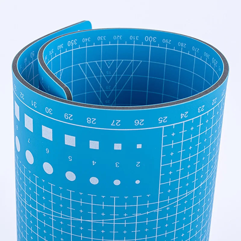 PVC cutting pad in various sizes, ideal for art drawing, patchwork sewing, and craft projects, providing a protective surface.