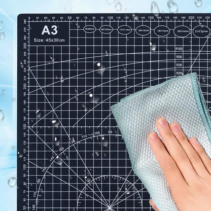 PVC cutting pad in various sizes, used as a protective table mat for art drawing, patchwork sewing, and craft making.
