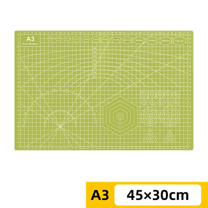 PVC cutting pad in various sizes, ideal for art drawing, patchwork sewing, and craft projects, provides protective surface for creative work.