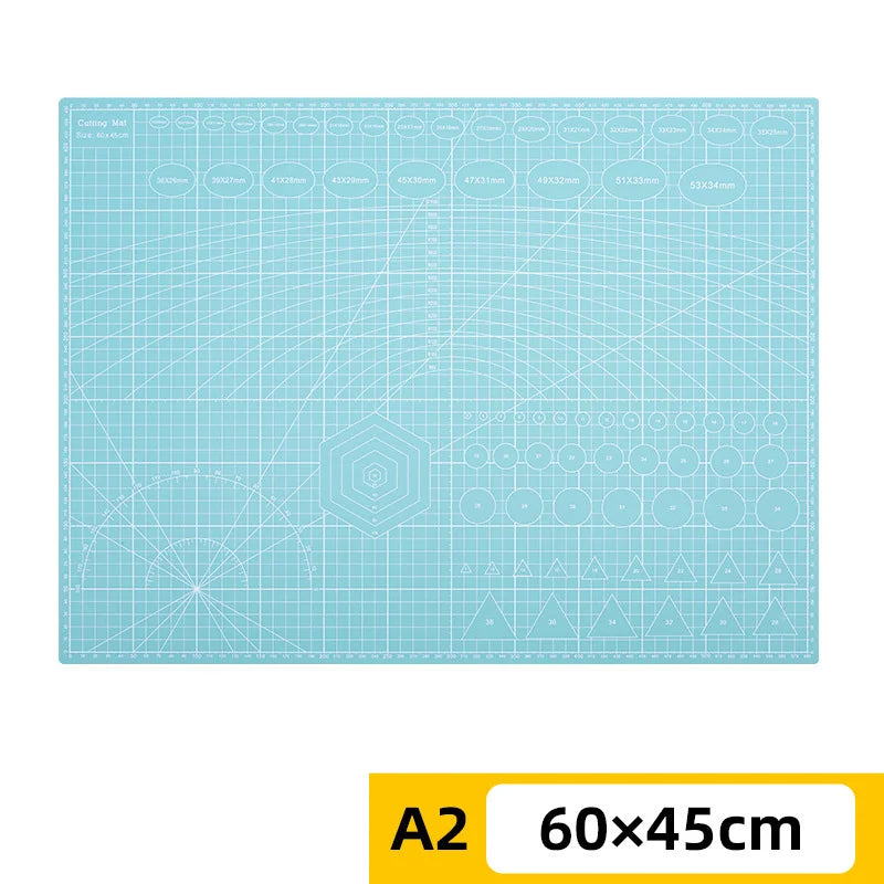 PVC cutting pad in various sizes, used as a protective table mat for art drawing, patchwork sewing, and craft making.