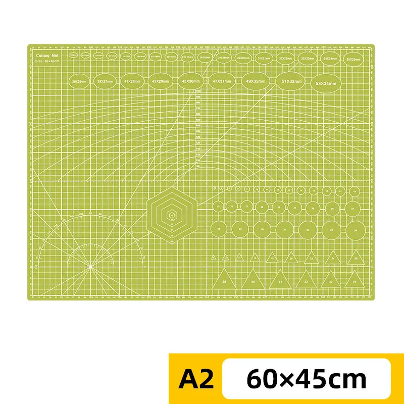 PVC cutting pad in various sizes, used as a protective table mat for art drawing, patchwork sewing, and craft projects.