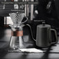Amber gold hand-brewed coffee maker set with borosilicate glass dripper, sharing pot, and V02 coffee filter for fresh coffee brewing.