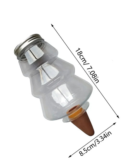 Automatic flower watering machine by BackupMyFilesNow.com, showing a household self-watering irrigation device for plants.