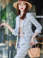 Apricot women's summer business pant suit from BackupMyFilesNow.com, stylish office workwear for professional women.