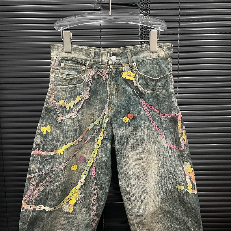 Women’s high waist casual denim jeans with 3D chain print, contrast colors, and niche design by DEAT Fashion.