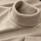 Black men's knitted turtleneck sweater by BACKUPMYFILESNOW.COM®, breathable, warm, solid color, suitable for outdoor and streetwear.