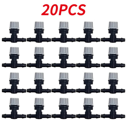 OAISI 20-pack plastic garden watering misting sprinkler heads with nozzles and tee joints for irrigation systems.