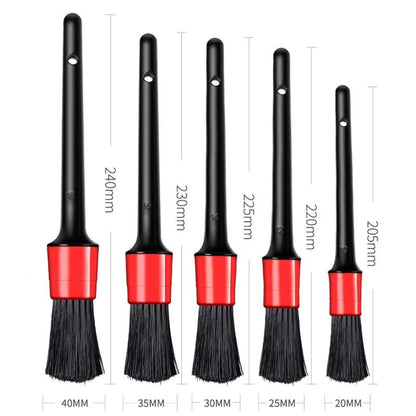 Automotive car cleaning brush kit with interior detailing brushes, wheel rim cleaning brushes, and plastic detail tools.