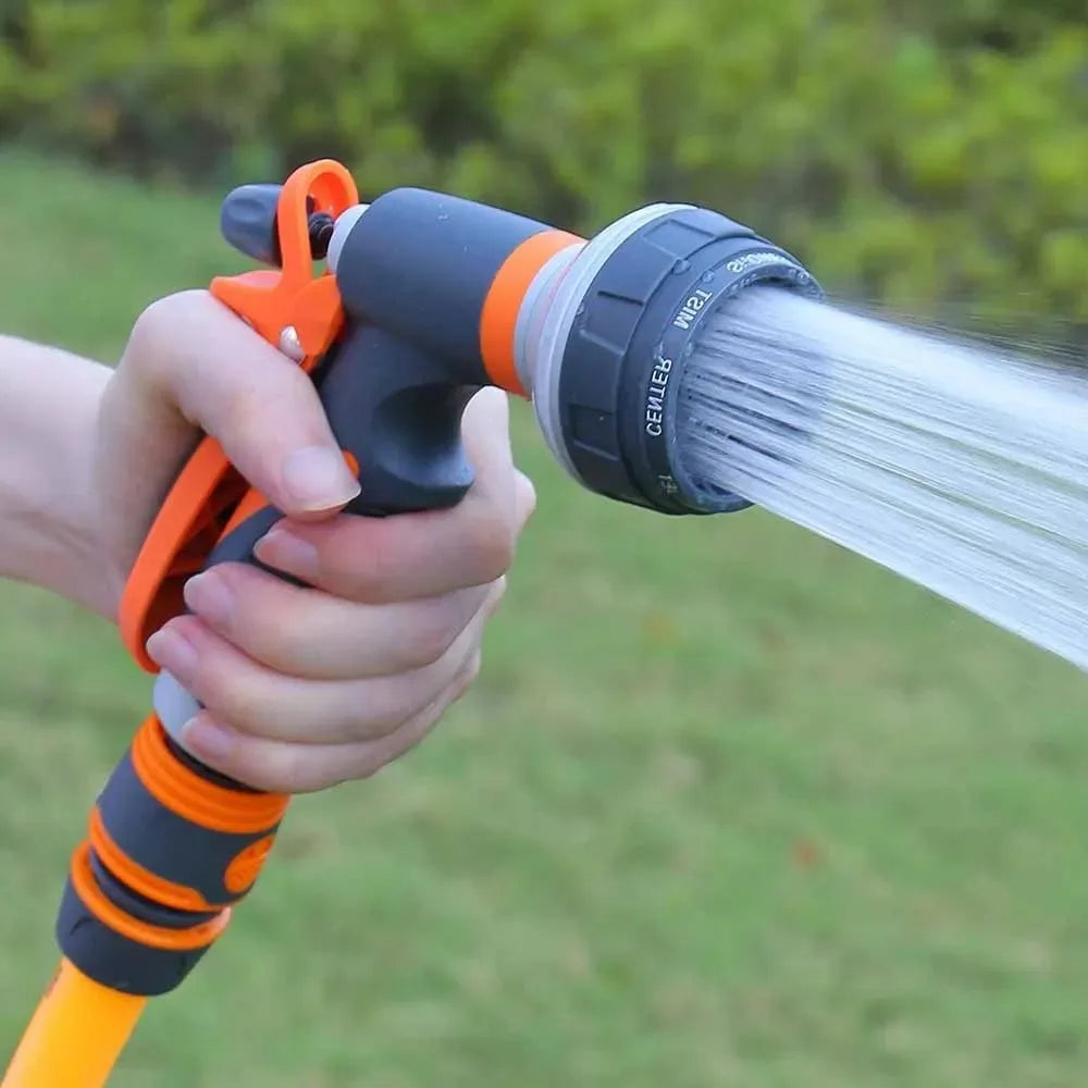 BackupMyFilesNow.com watering water gun with sprinkler head for garden, vegetable watering, gardening, and household watering.