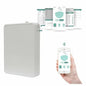 Smart Bluetooth-controlled essential oil diffuser, wall-mounted 500ml scent machine for home or hotel use, with battery operation.