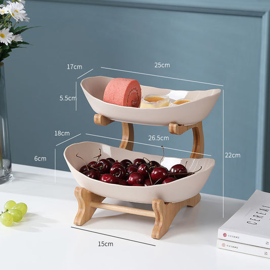 Beige multi-layer fruit rack by BACKUPMYFILESNOW.COM® with two tiers for organized fruit storage.