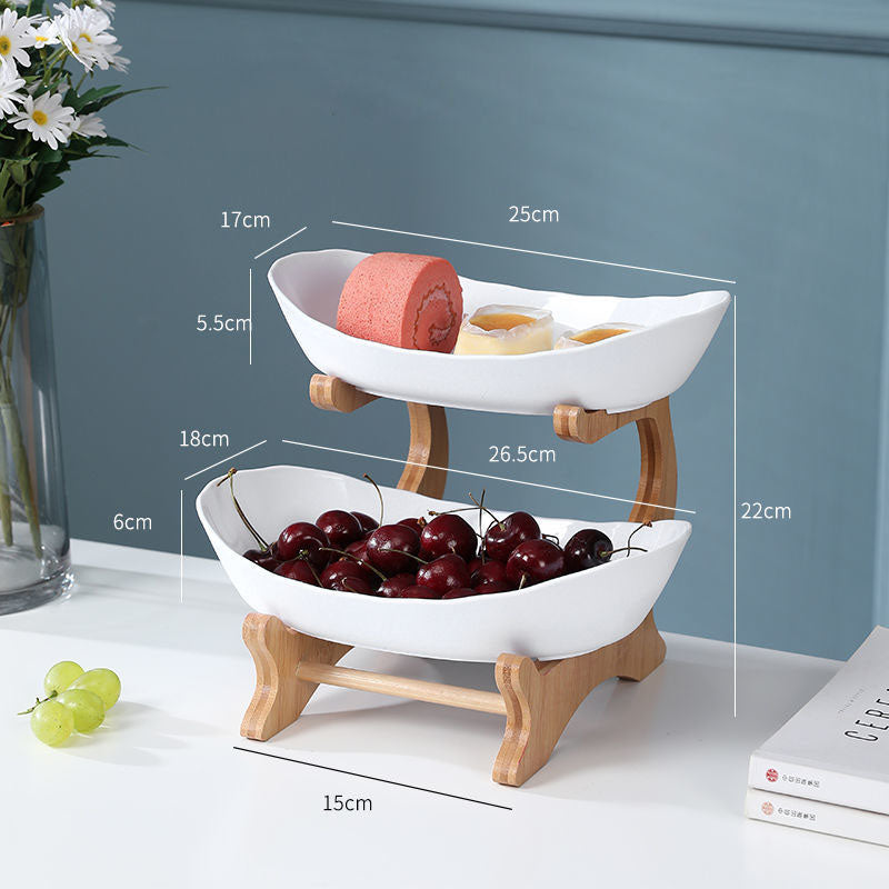 Beige multi-layer fruit rack by BACKUPMYFILESNOW.COM® with two tiers for organized fruit storage.