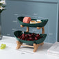 Beige multi-layer fruit rack from BACKUPMYFILESNOW.COM® with two tiers for organizing fresh fruit and produce.